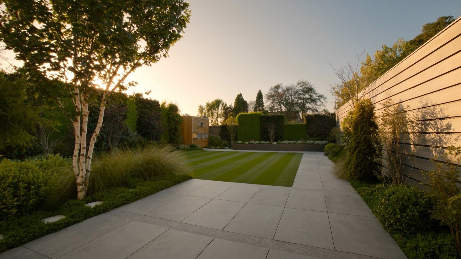 A beautifully landscaped garden at golden hour
